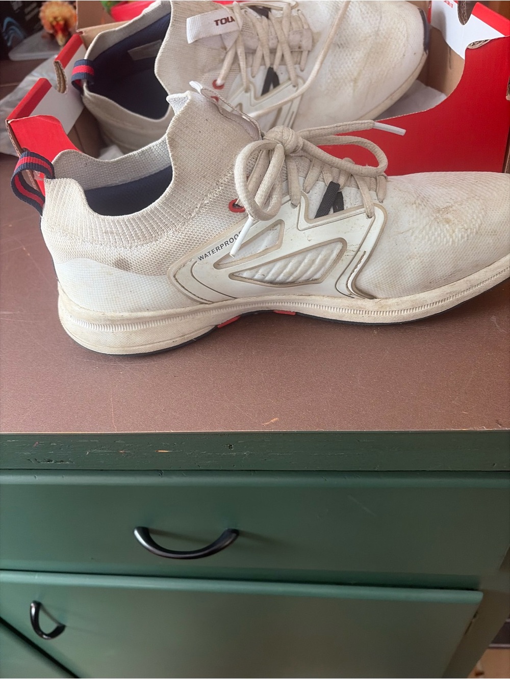 Nike White Athletic Shoes with Red and Black Accents
